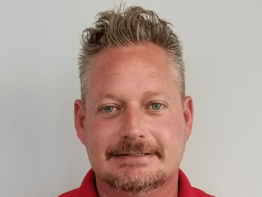 Staff member KC Gorda from ID_f3325fb48207