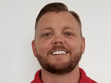 Staff member Mike Bossman from ID_41a9e868ae3d