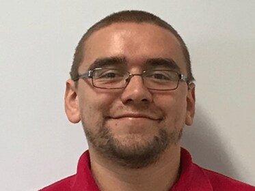 Staff member Eli Farrand from ID_96c644313757