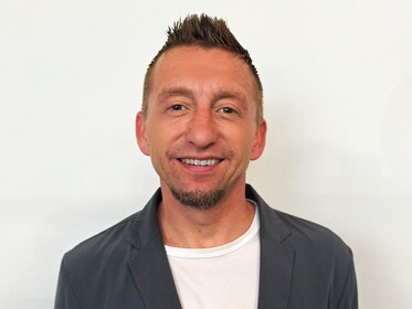 Staff member Justin Thomas from b0145a99d5ae