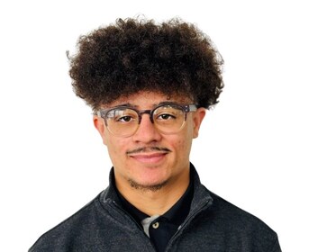 Staff member Cameron Cassel from b0145a99d5ae