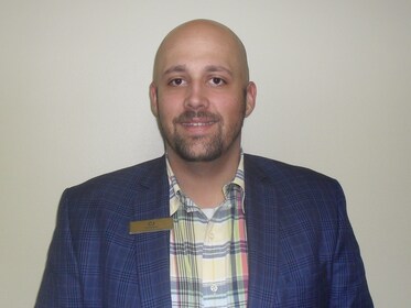 Staff member Charles "CJ" Cavanagh III from ID_ea0a768edc39
