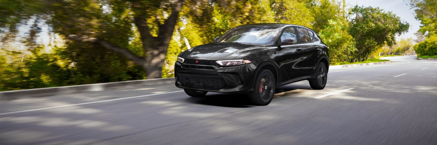 Dodge Hornet driving on a road