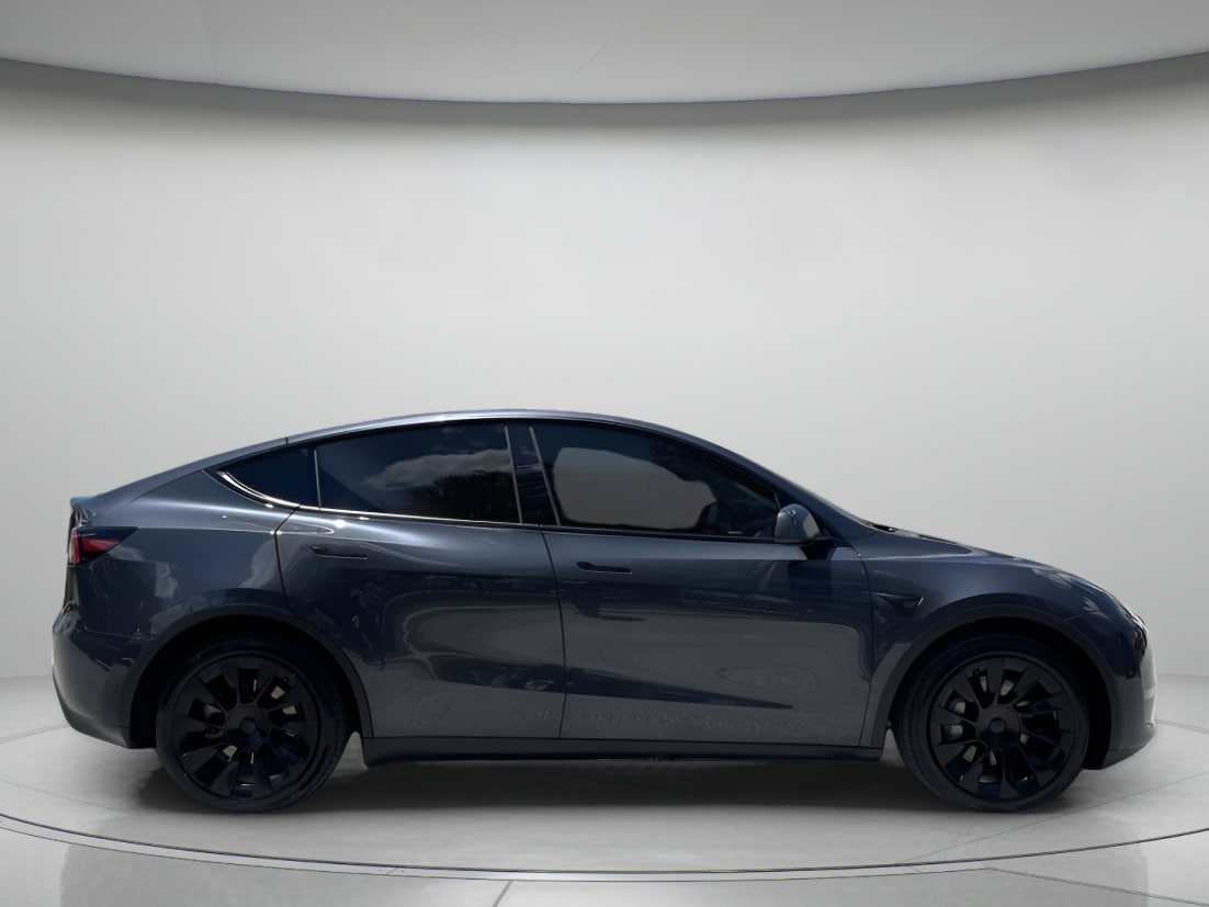 Used 2024 Tesla Model Y Long Range with VIN 7SAYGDEE8RA244360 for sale in Orlando, FL