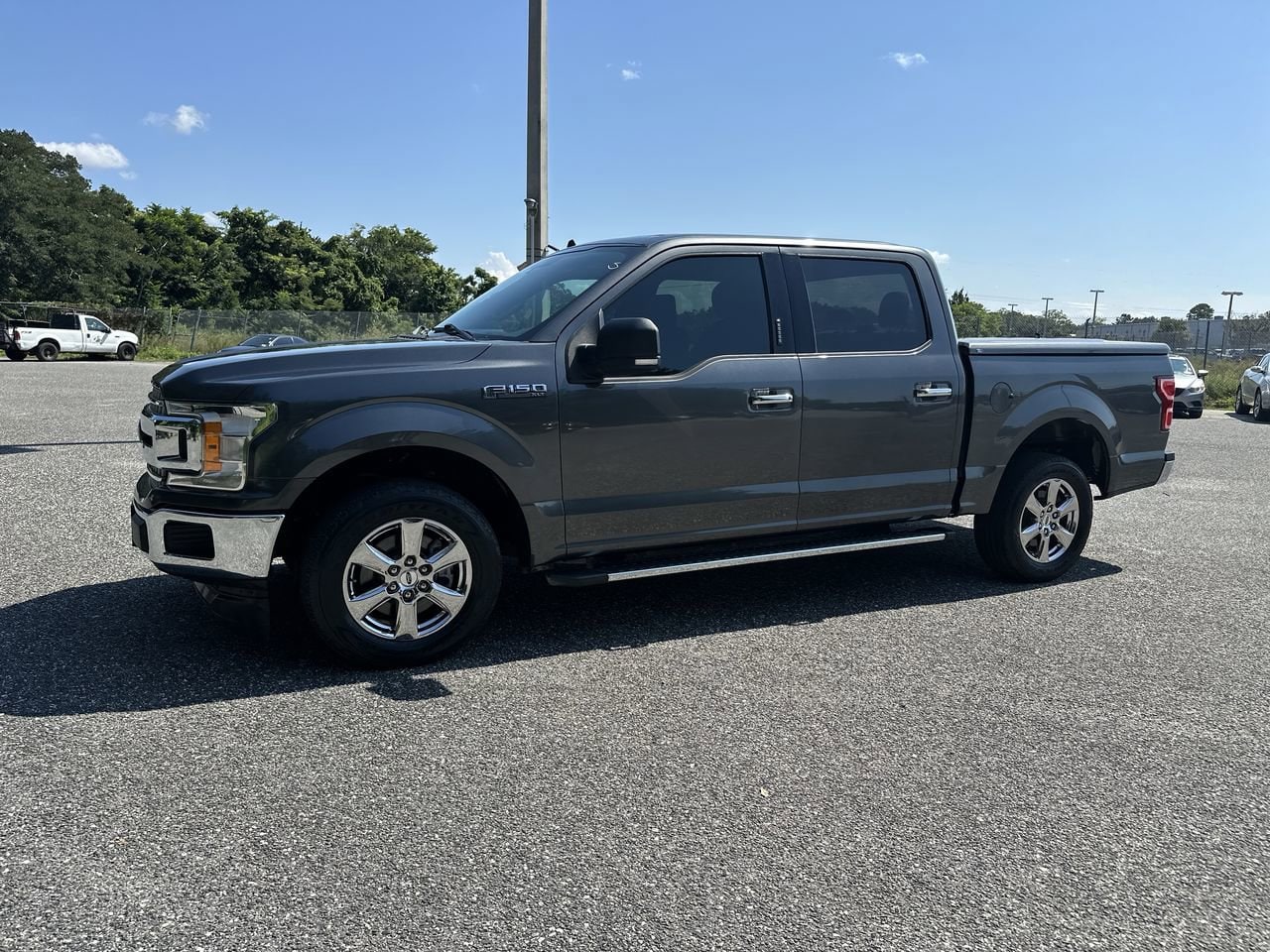 Used 2019 Ford F-150 XLT with VIN 1FTEW1C56KFD42201 for sale in Orlando, FL