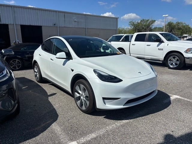 Used 2024 Tesla Model Y Long Range with VIN 7SAYGDED7RF018952 for sale in Orlando, FL