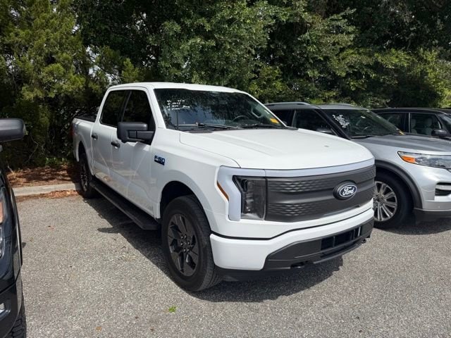 Used 2024 Ford F-150 Lightning XLT with VIN 1FTVW3LK7RWG18624 for sale in Orlando, FL