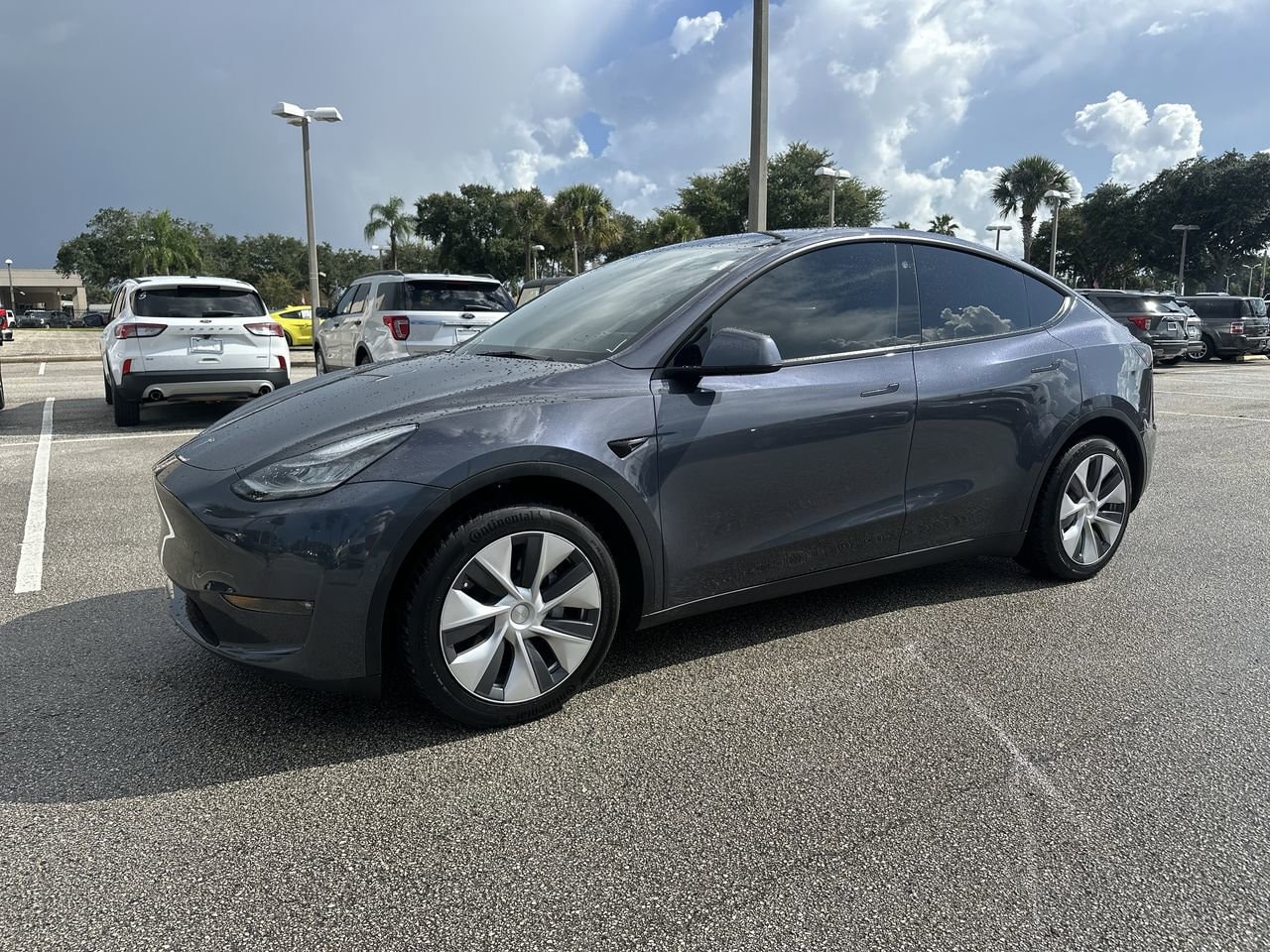 Used 2022 Tesla Model Y Long Range with VIN 7SAYGDEE1NF430920 for sale in Orlando, FL