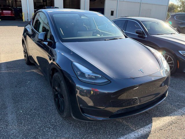 Used 2025 Tesla Model Y Long Range with VIN 7SAYGDED5SF266364 for sale in Orlando, FL