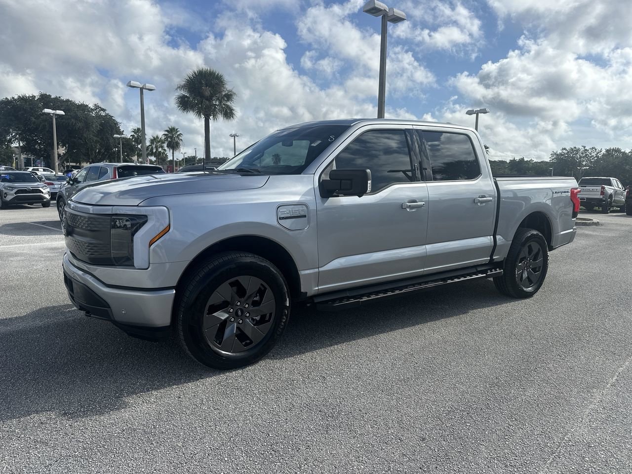 Used 2023 Ford F-150 Lightning XLT with VIN 1FT6W1EV7PWG35078 for sale in Orlando, FL