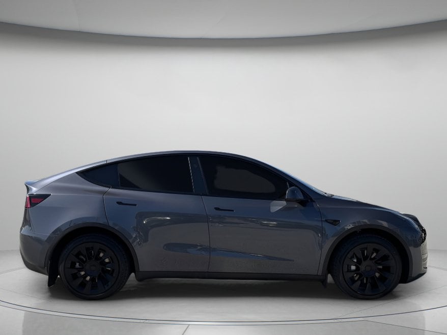 Used 2023 Tesla Model Y Long Range with VIN 7SAYGDEE6PF880551 for sale in Orlando, FL