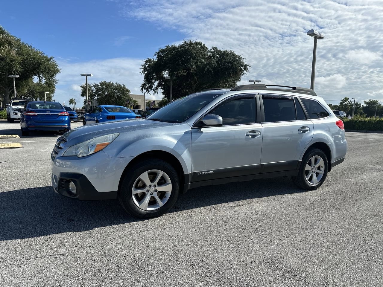 Used 2014 Subaru Outback Limited with VIN 4S4BRDLC2E2271709 for sale in Orlando, FL