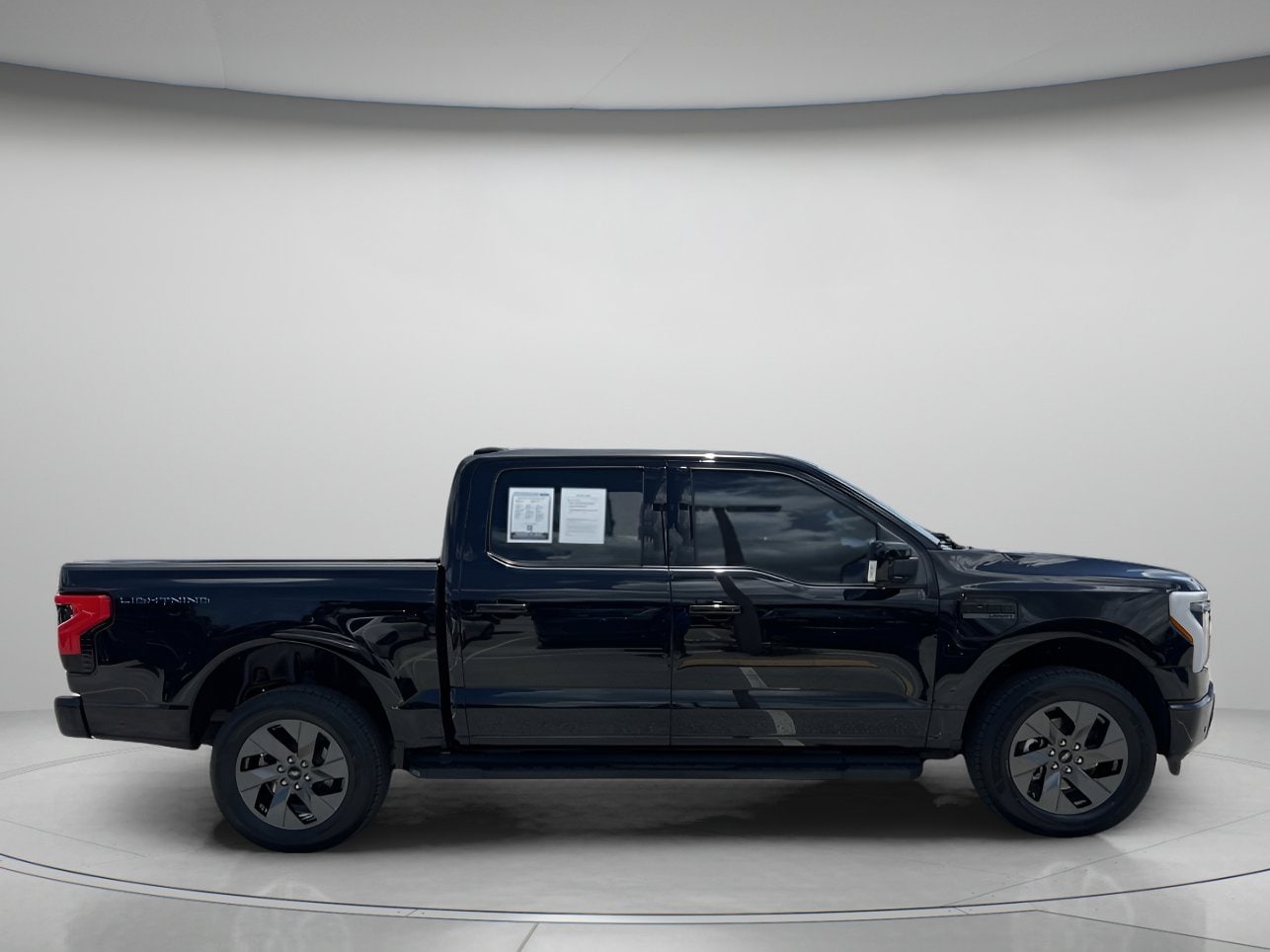 Used 2023 Ford F-150 Lightning Lariat with VIN 1FTVW1EL2PWG20921 for sale in Orlando, FL