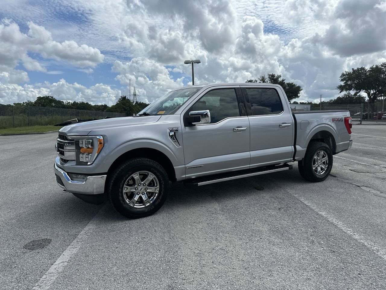 Used 2021 Ford F-150 Lariat with VIN 1FTFW1ED9MFB67809 for sale in Orlando, FL