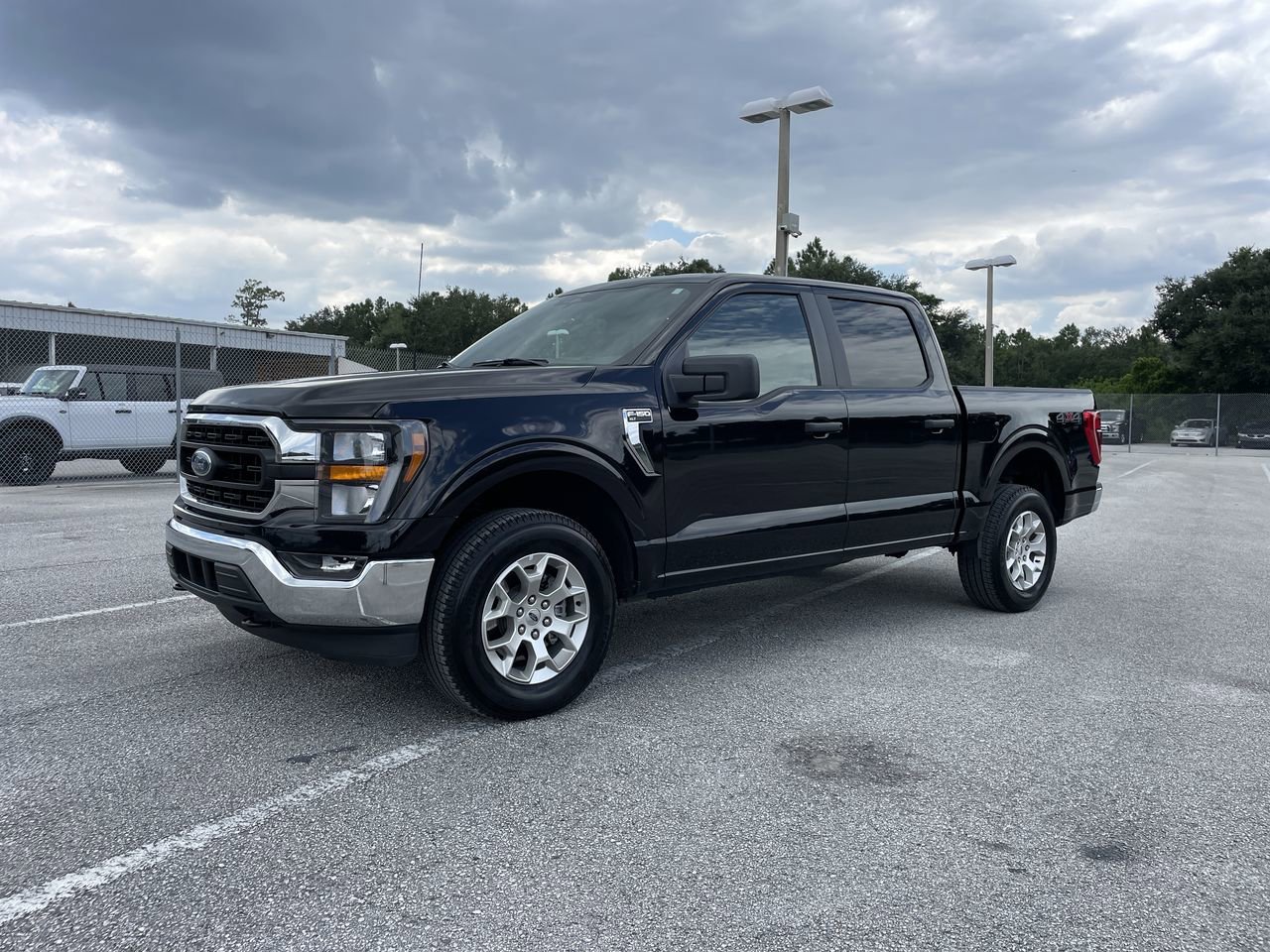 Used 2023 Ford F-150 XLT with VIN 1FTFW1E84PKE14815 for sale in Orlando, FL