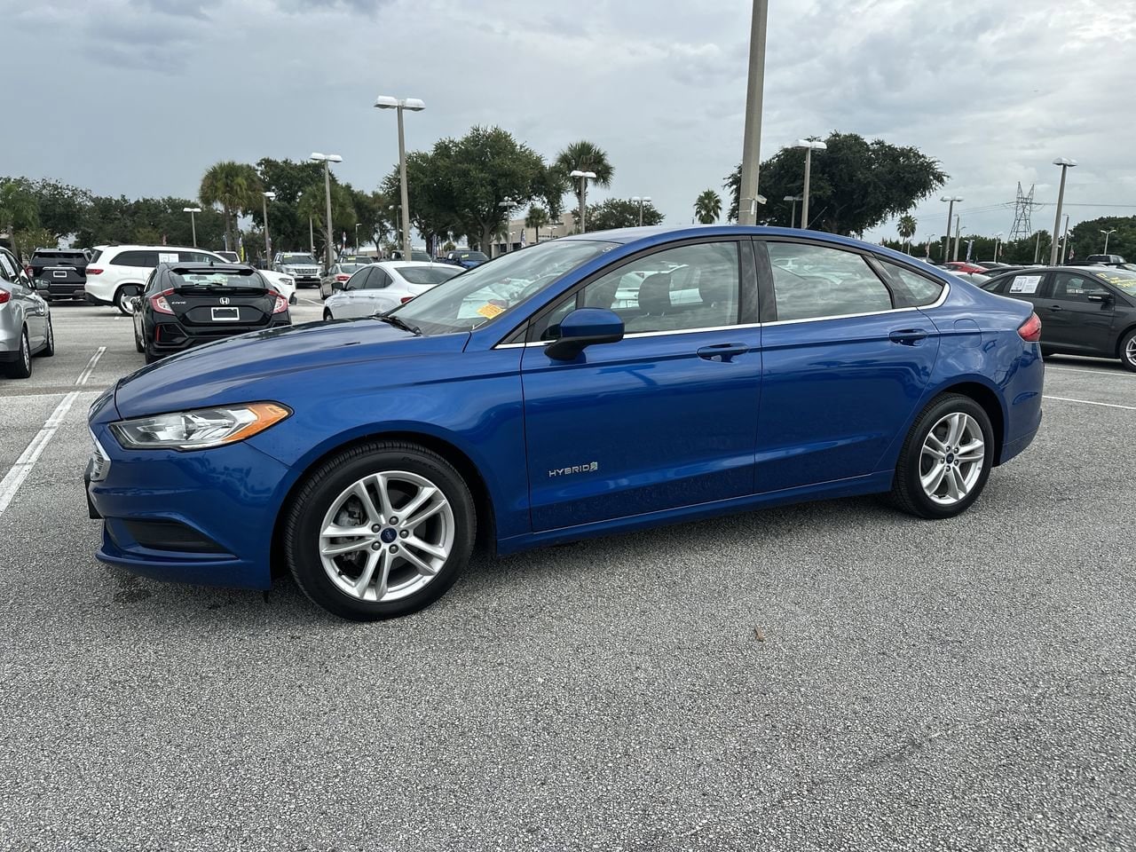 Used 2018 Ford Fusion Hybrid S with VIN 3FA6P0UU0JR101002 for sale in Orlando, FL