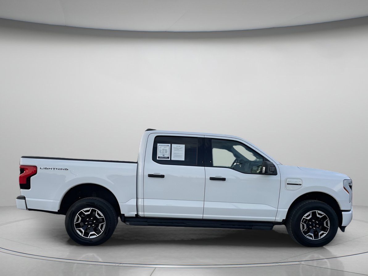 Used 2023 Ford F-150 Lightning XLT with VIN 1FTVW1EL9PWG19880 for sale in Orlando, FL