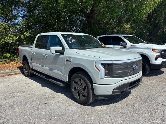 Used 2023 Ford F-150 Lightning Lariat with VIN 1FTVW1EV5PWG10434 for sale in Orlando, FL