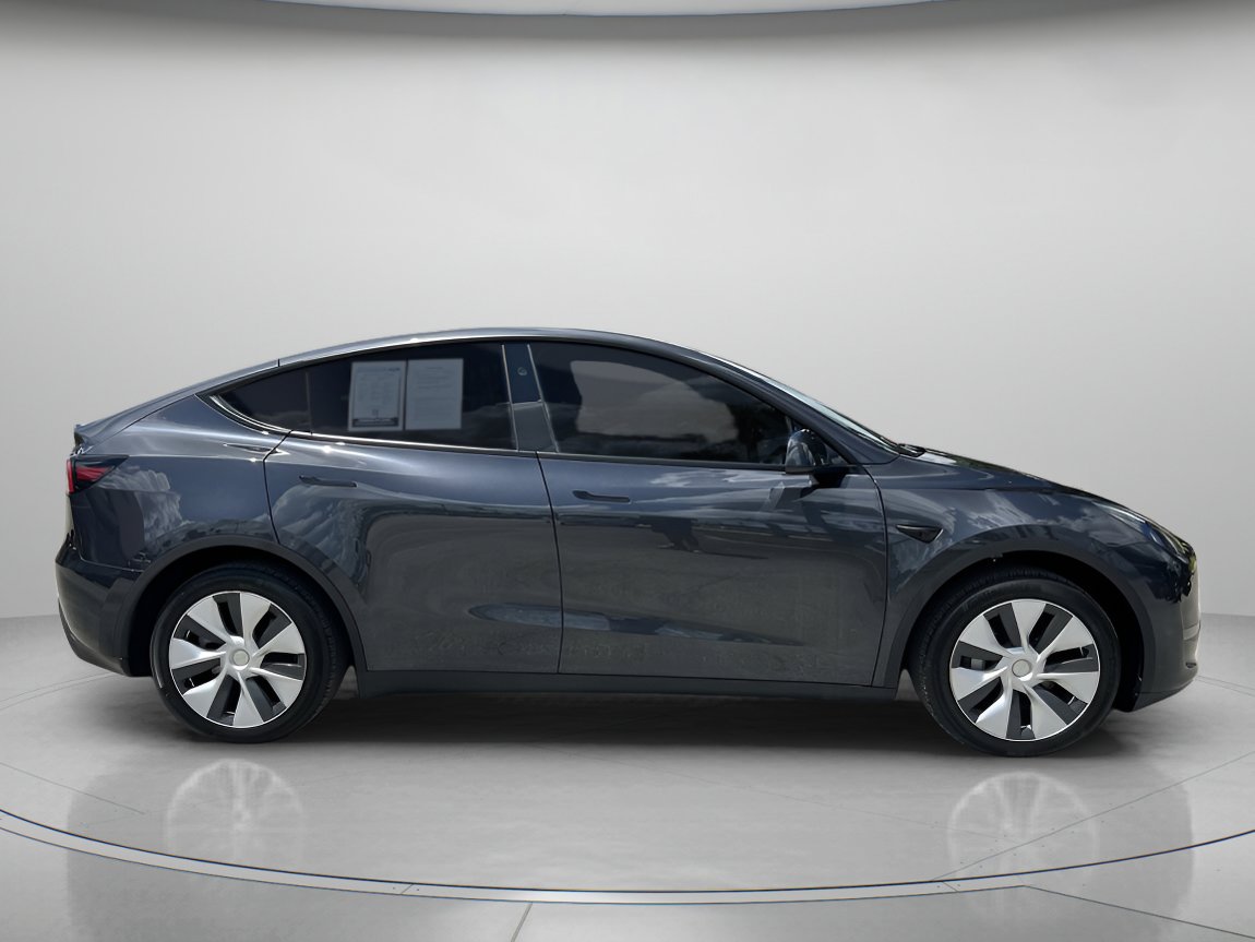 Used 2024 Tesla Model Y Long Range with VIN 7SAYGDED9RF094303 for sale in Orlando, FL