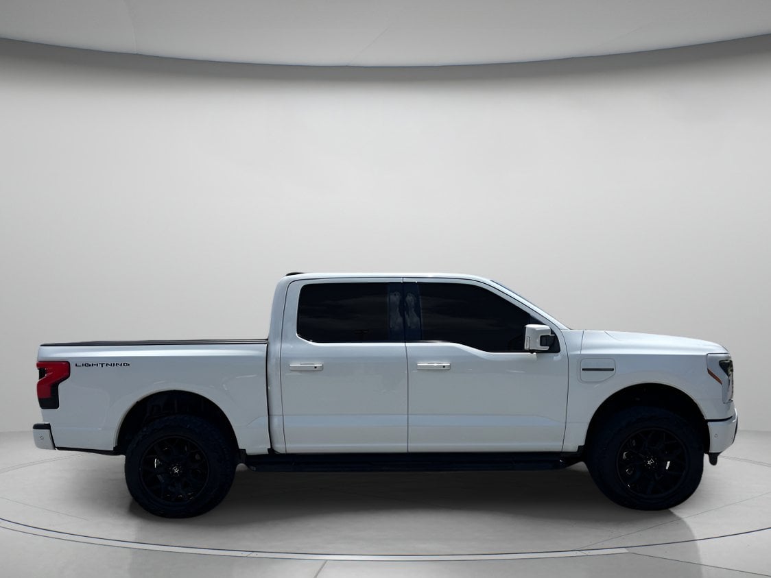 Used 2023 Ford F-150 Lightning Lariat with VIN 1FT6W1EV3PWG05916 for sale in Orlando, FL