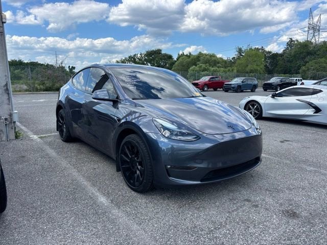 Used 2023 Tesla Model Y Long Range with VIN 7SAYGDEE6PF880551 for sale in Orlando, FL
