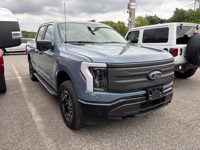 Used 2023 Ford F-150 Lightning Pro with VIN 1FTVW1EL2PWG07103 for sale in Orlando, FL