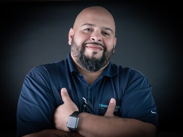 Staff member Tito Burgos from 8d4b74ce1a4e