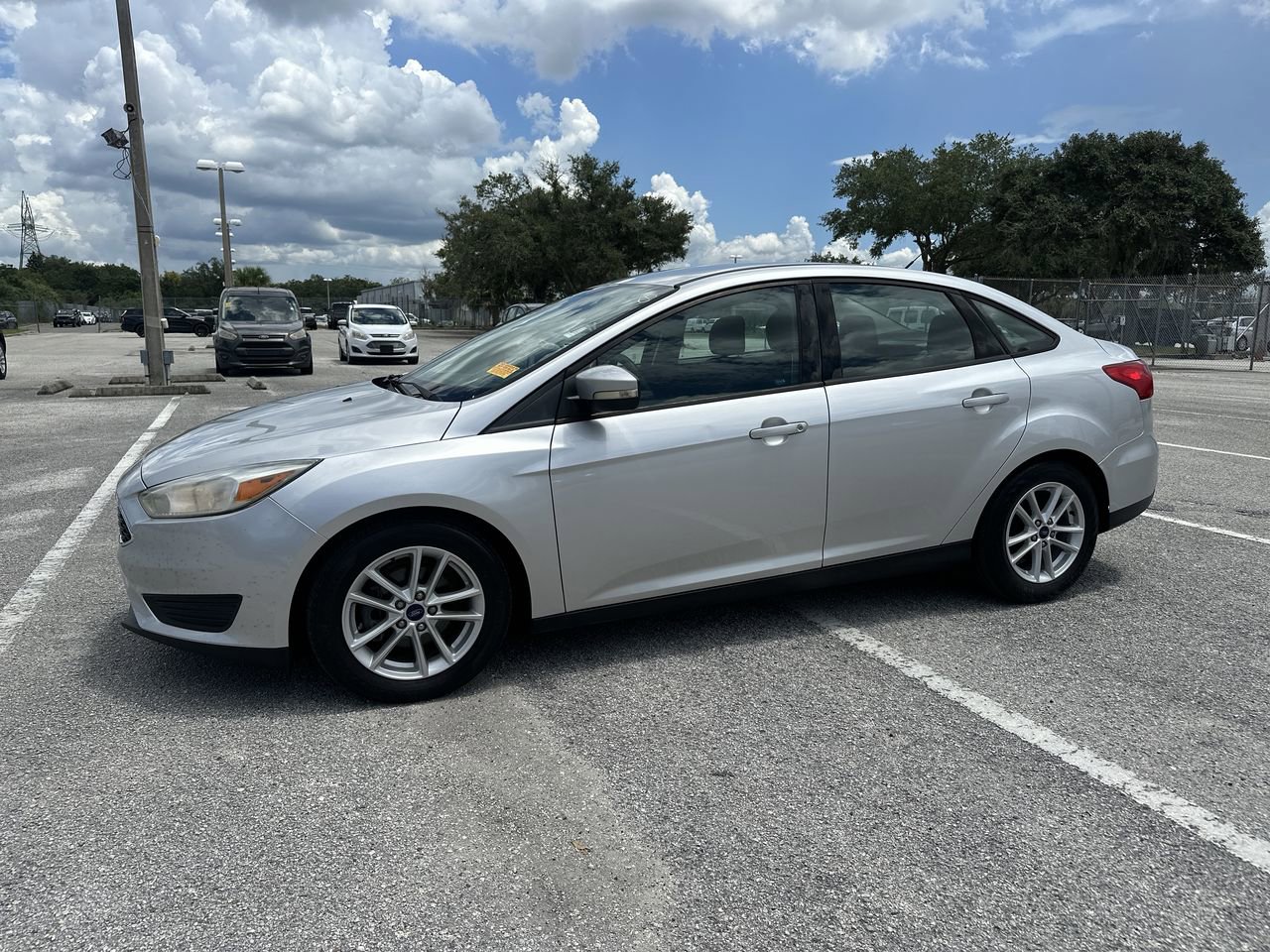 Used 2017 Ford Focus SE with VIN 1FADP3F20HL320037 for sale in Orlando, FL