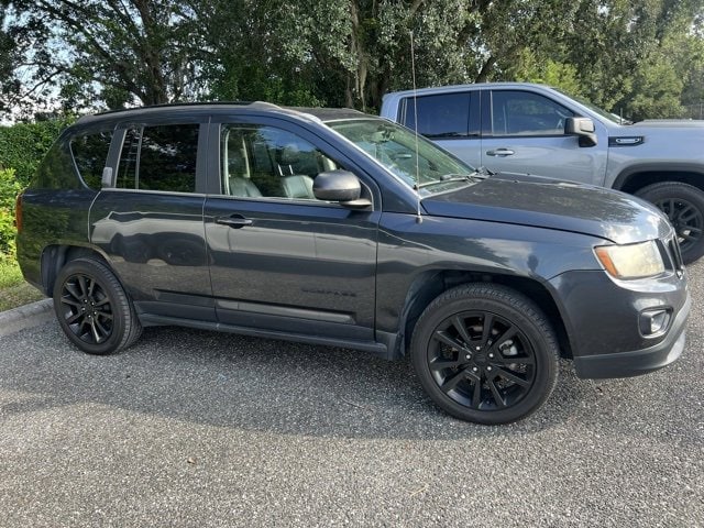 Used 2014 Jeep Compass Sport with VIN 1C4NJCBA7ED849472 for sale in Orlando, FL