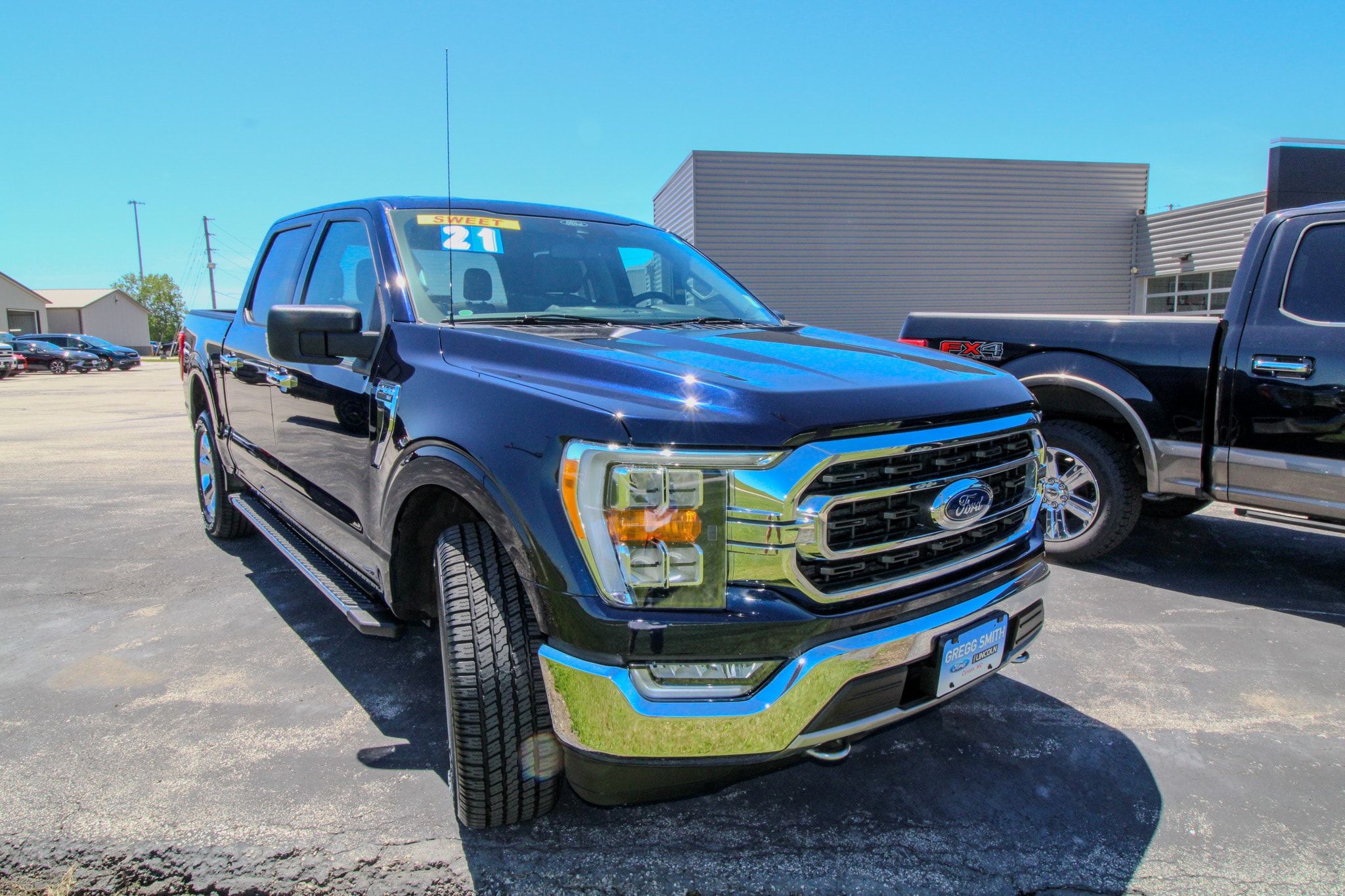 Used 2021 Ford F-150 XLT with VIN 1FTFW1E86MFA33486 for sale in Clinton, MO