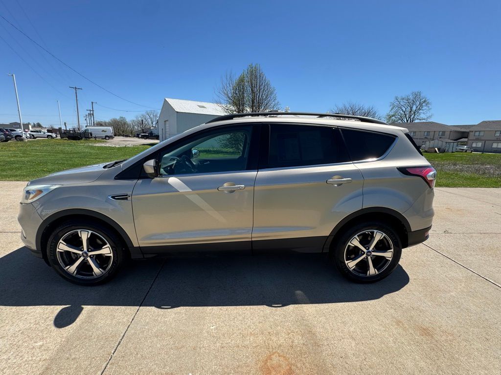 Used 2017 Ford Escape SE with VIN 1FMCU0GD2HUE00975 for sale in Ottumwa, IA