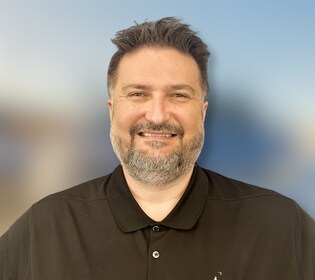 Staff member Alex "Rob" Tiganus from ID_8a6753