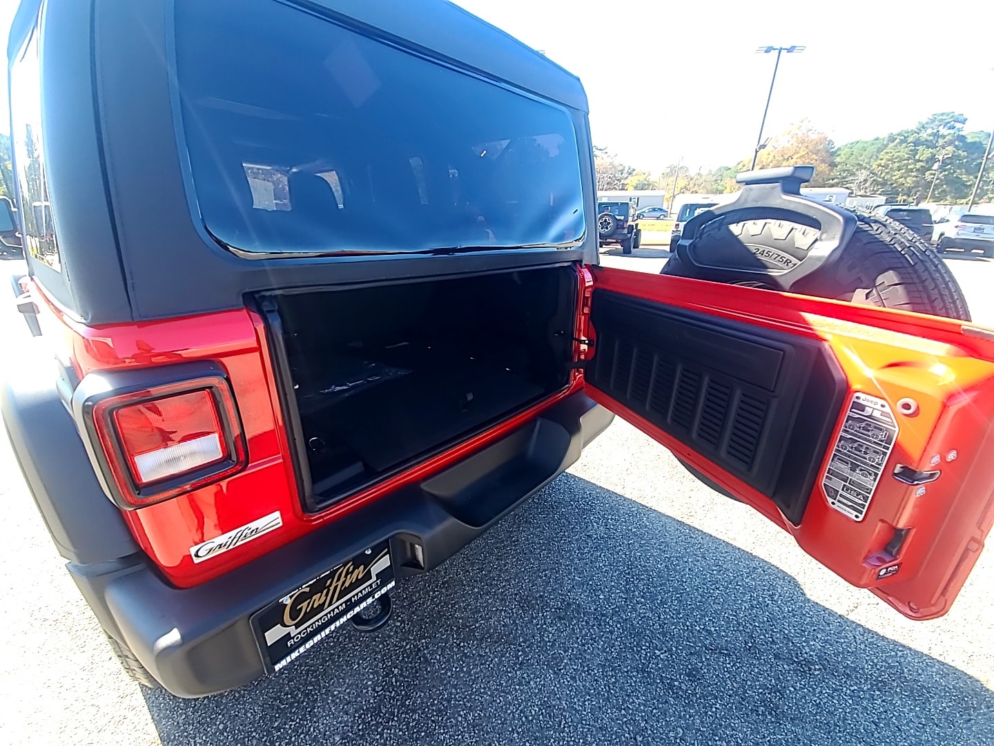 2026 Jeep Wrangler 4-DOOR SPORT firecracker red clearcoat at Griffin CDJR