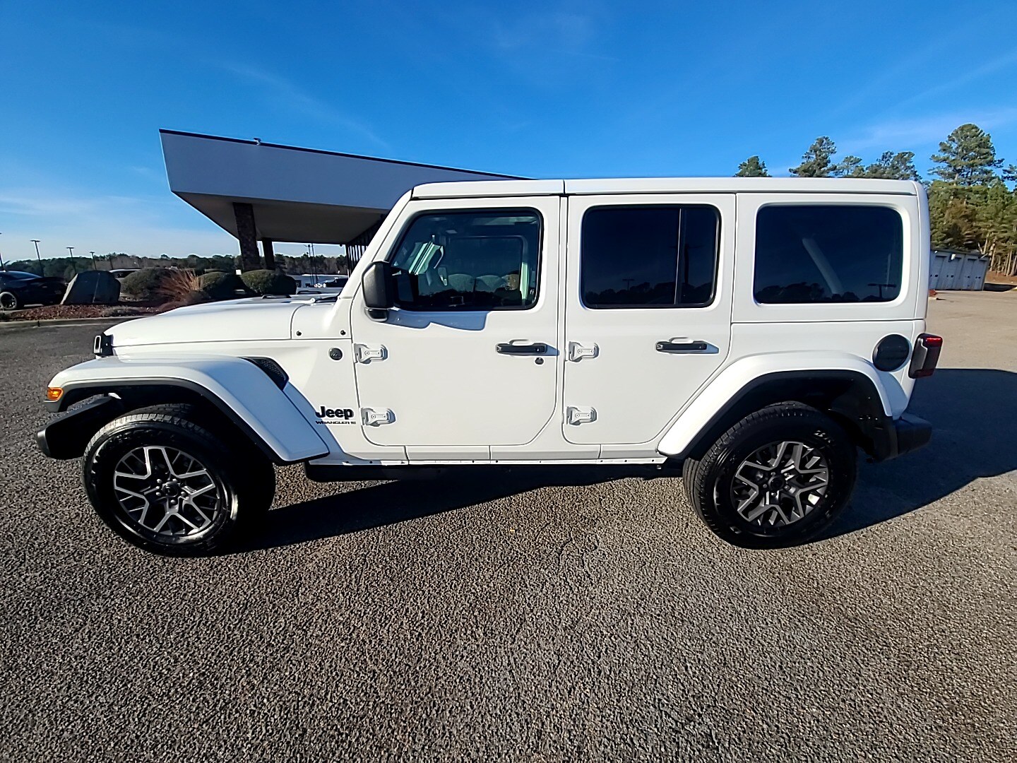 2026 Jeep Wrangler 4-DOOR SAHARA bright white clearcoat at Griffin CDJR