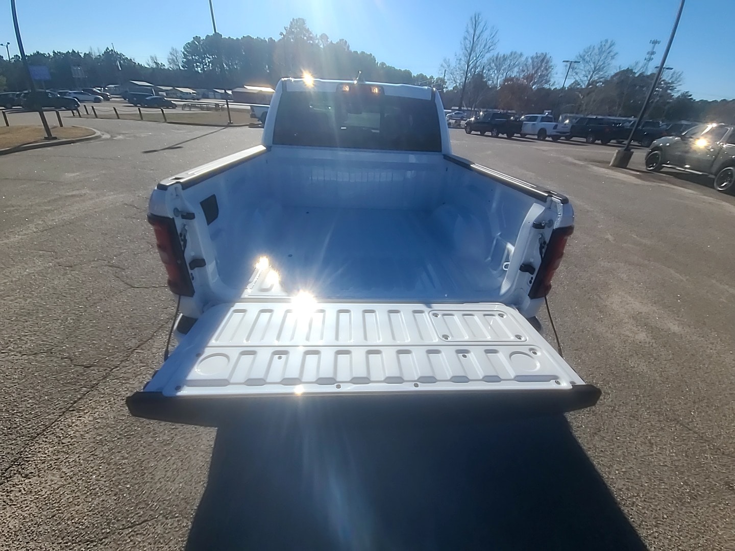 2026 Ram 1500 LARAMIE CREW CAB 4X4 5'7 BOX Ivory White Tri-Coat Pearlcoat at Griffin CDJR