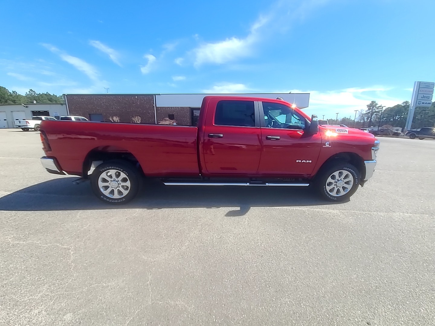 2026 Ram 2500 BIG HORN CREW CAB 4X4 8' BOX Molten Red Pearlcoat at Griffin CDJR