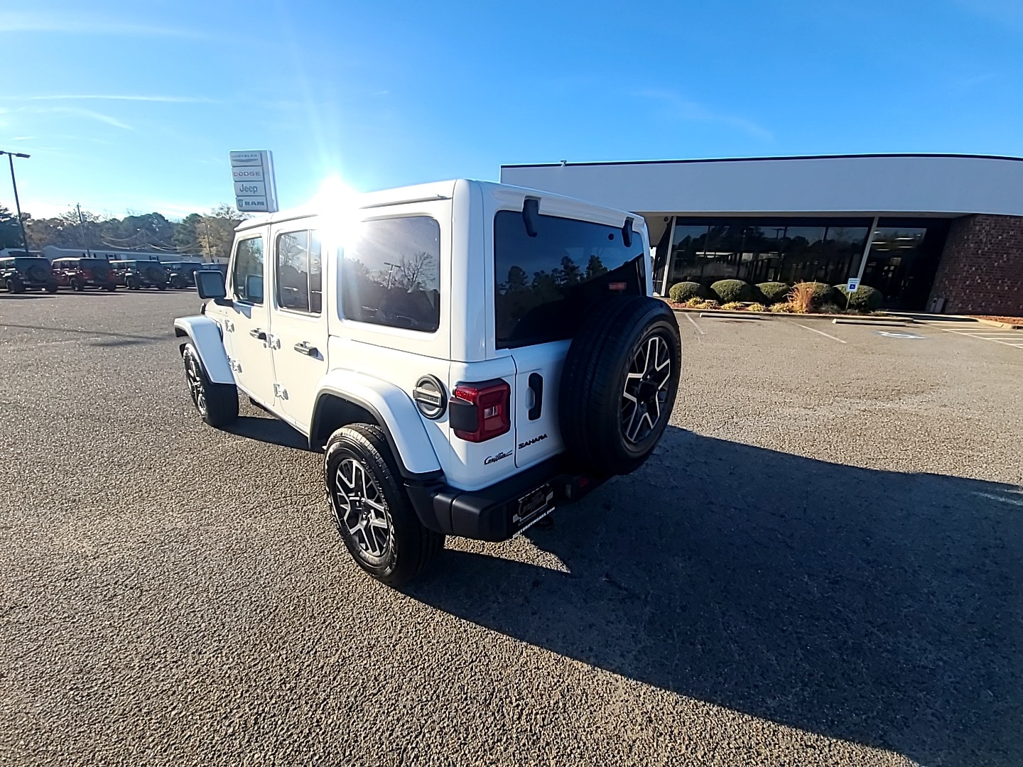 2026 Jeep Wrangler 4-DOOR SAHARA bright white clearcoat at Griffin CDJR