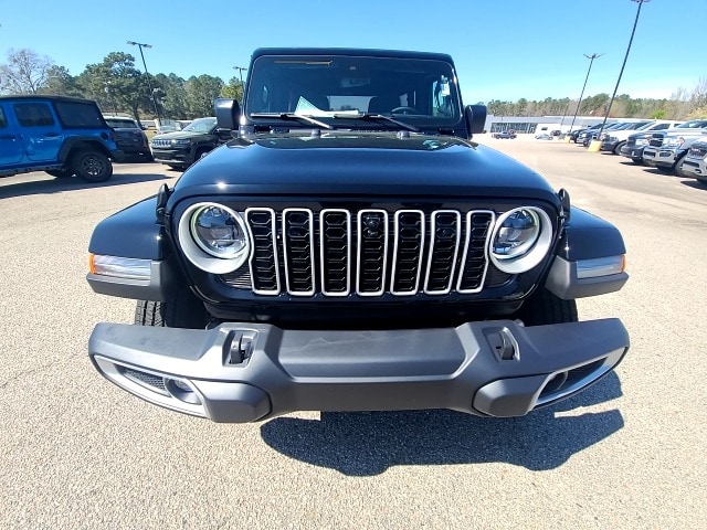 Used 2024 Jeep Wrangler 4-Door Sahara with VIN 1C4PJXEG5RW271625 for sale in Rockingham, NC