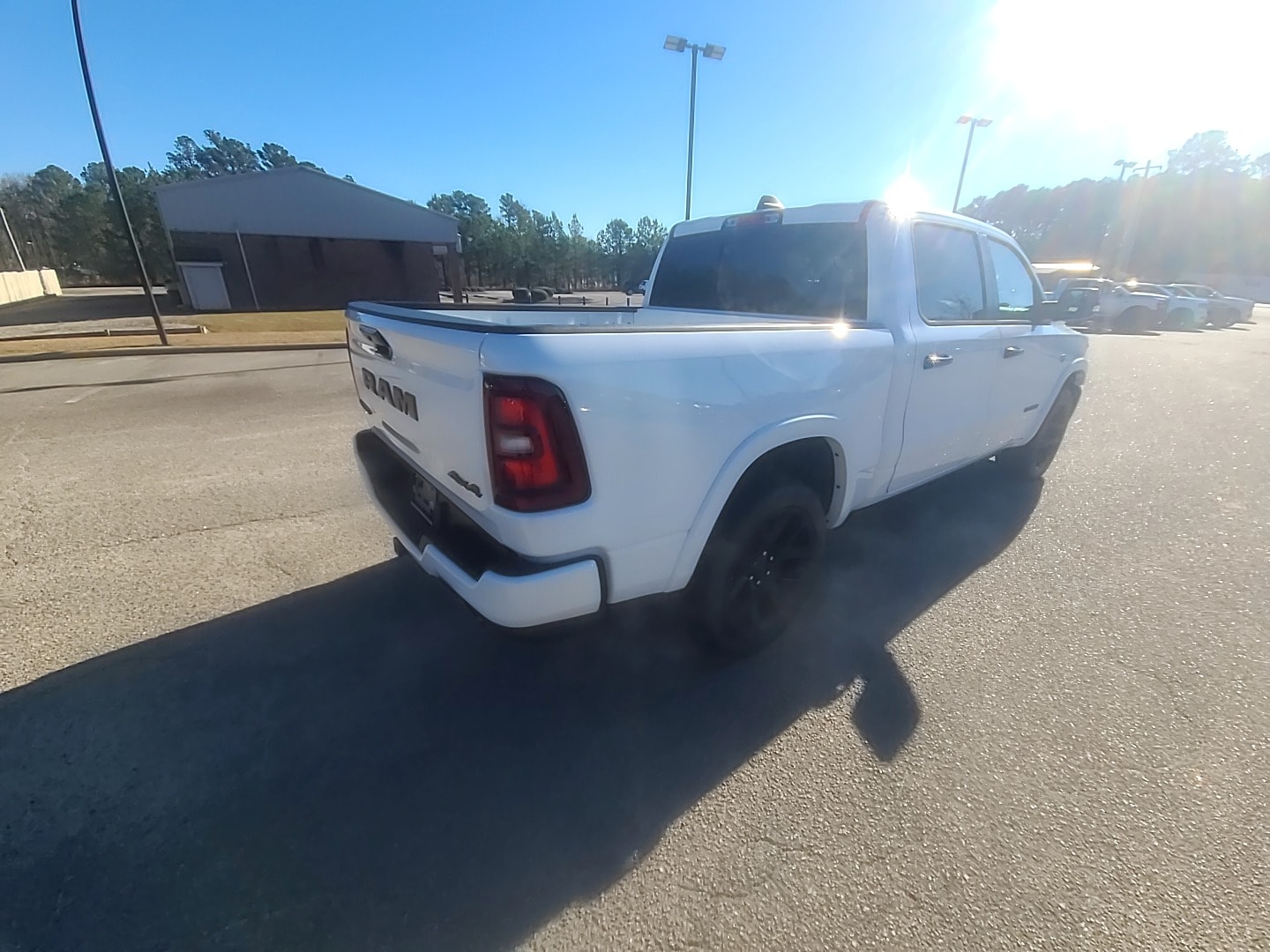 2026 Ram 1500 LARAMIE CREW CAB 4X4 5'7 BOX Ivory White Tri-Coat Pearlcoat at Griffin CDJR