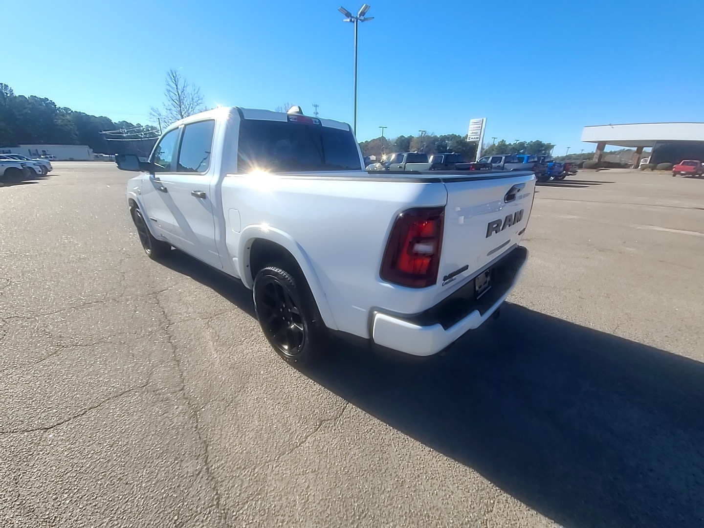2026 Ram 1500 LARAMIE CREW CAB 4X4 5'7 BOX Ivory White Tri-Coat Pearlcoat at Griffin CDJR