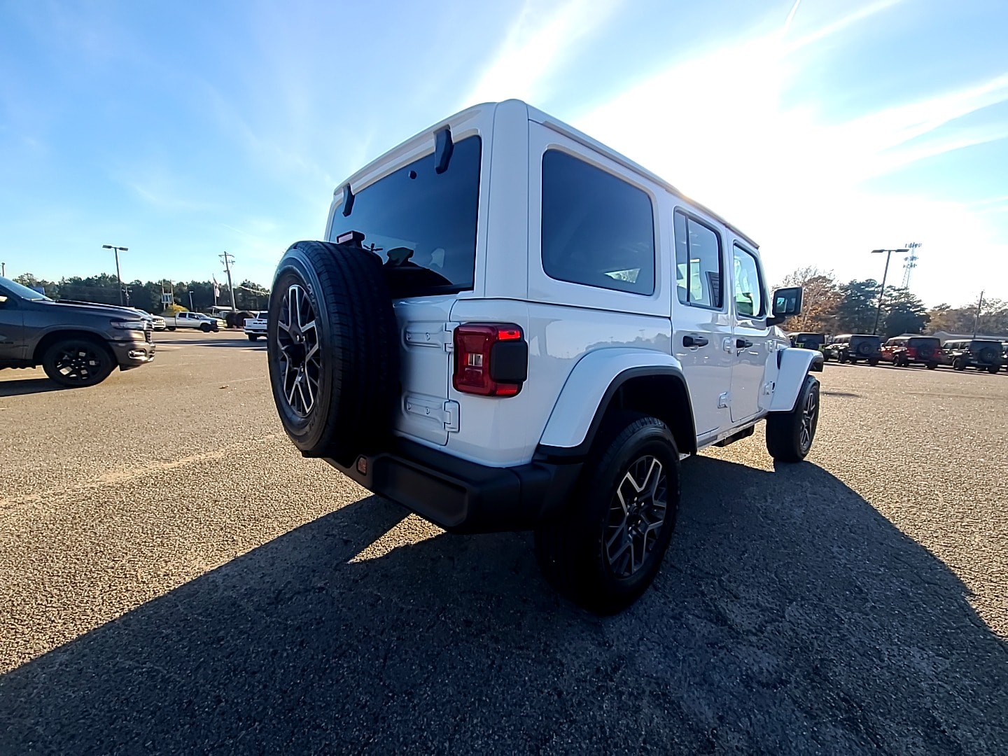 2026 Jeep Wrangler 4-DOOR SAHARA bright white clearcoat at Griffin CDJR