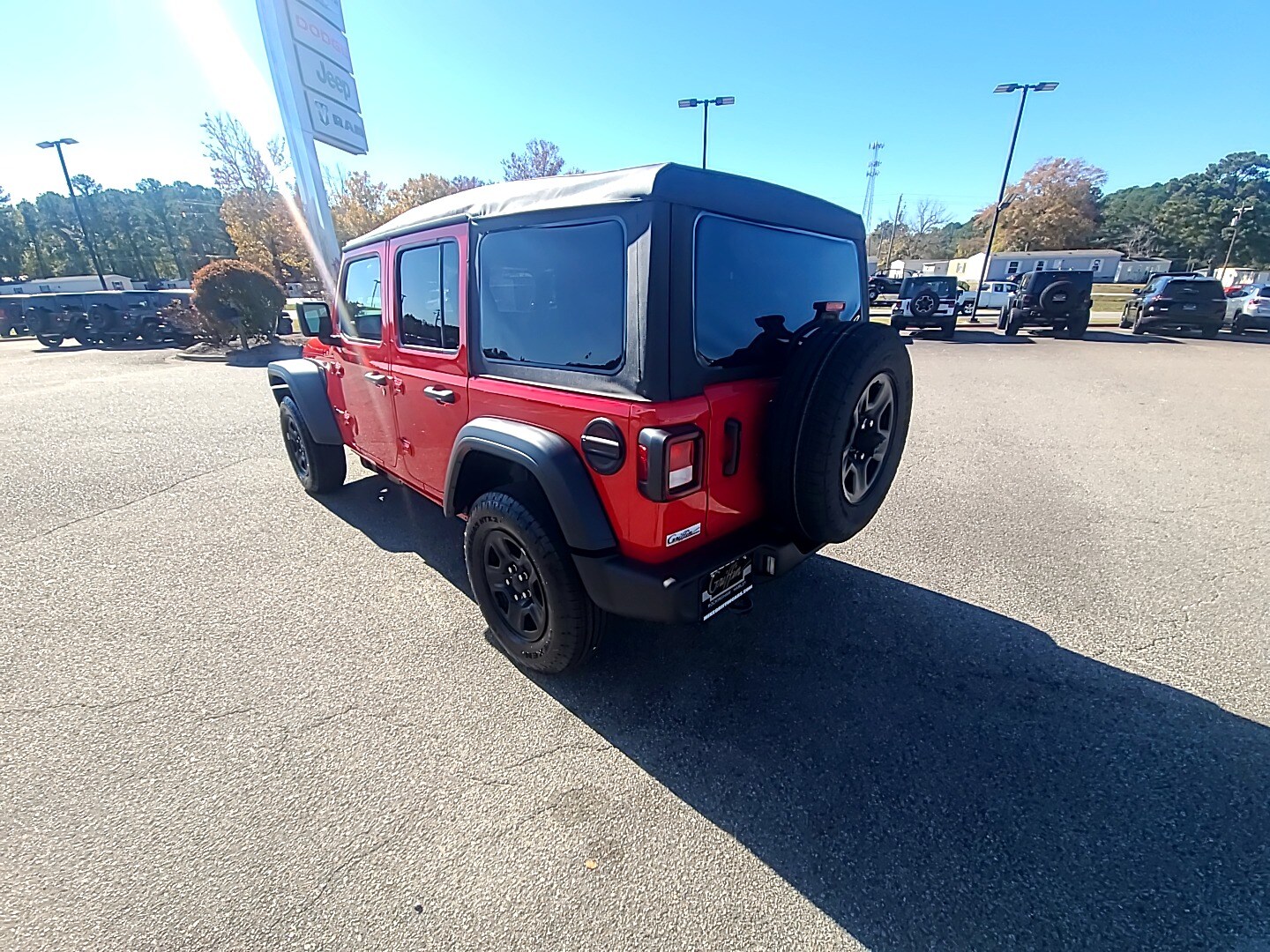 2026 Jeep Wrangler 4-DOOR SPORT firecracker red clearcoat at Griffin CDJR
