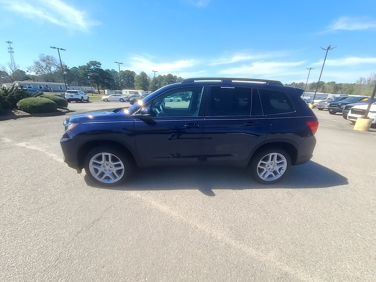 2025 Honda Passport EX-L Blue at Burns Honda