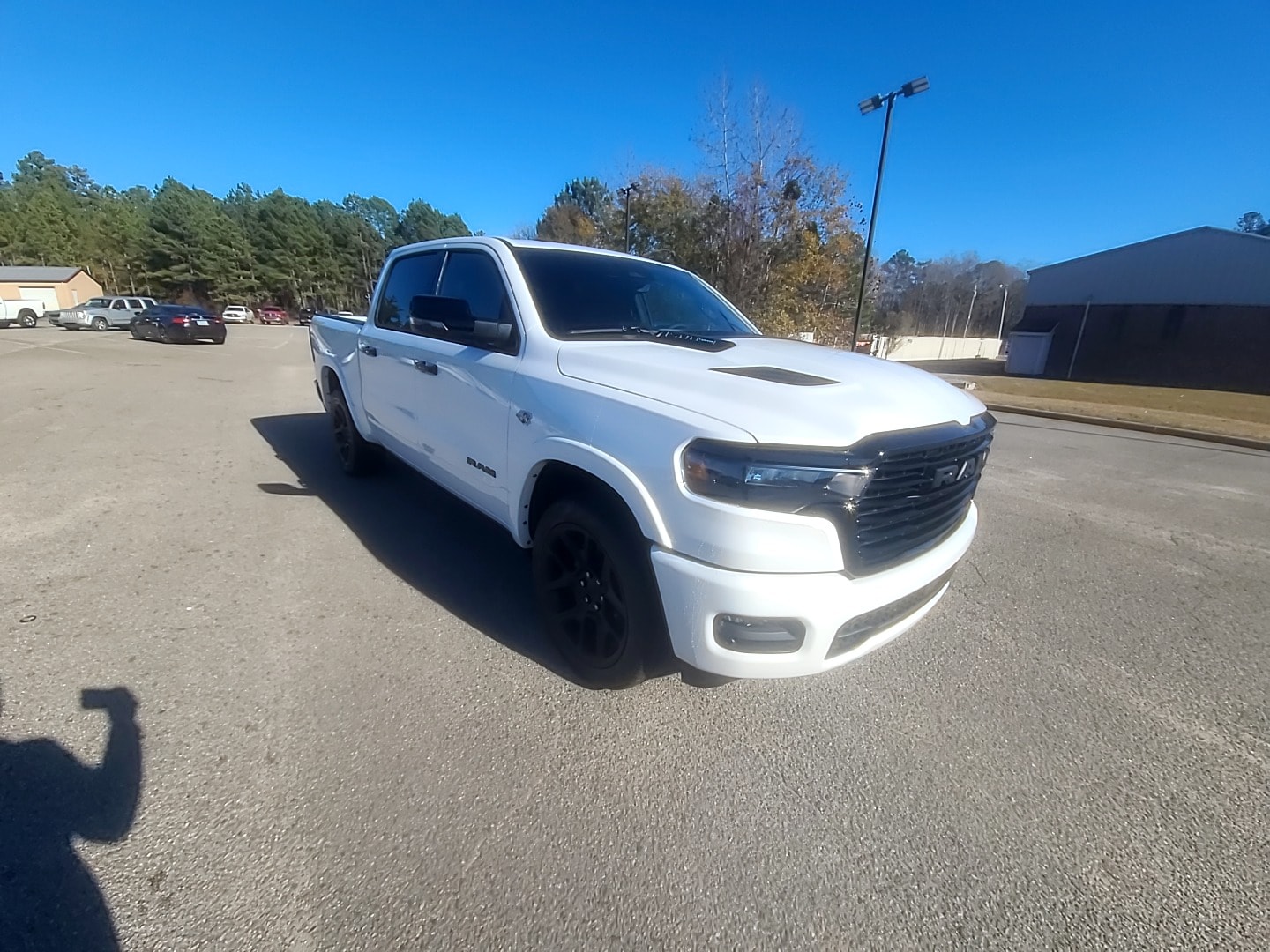 2026 Ram 1500 LARAMIE CREW CAB 4X4 5'7 BOX Ivory White Tri-Coat Pearlcoat at Griffin CDJR