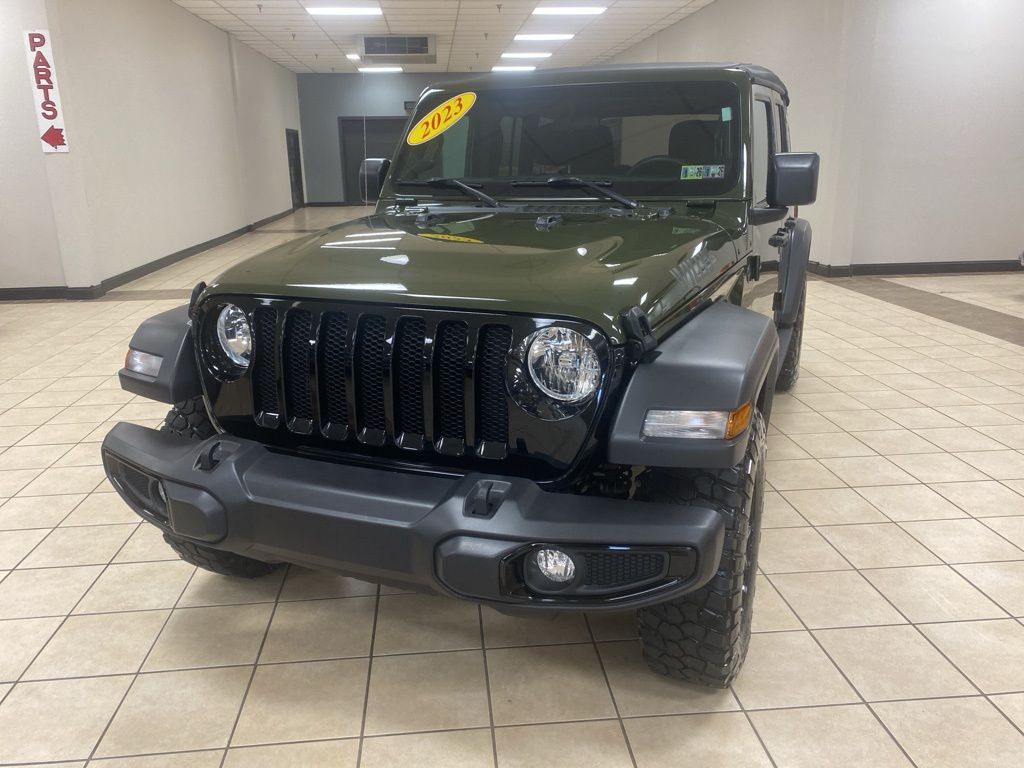 Used 2023 Jeep Wrangler 4-Door Willys Sport with VIN 1C4HJXDN5PW515906 for sale in Meadville, PA