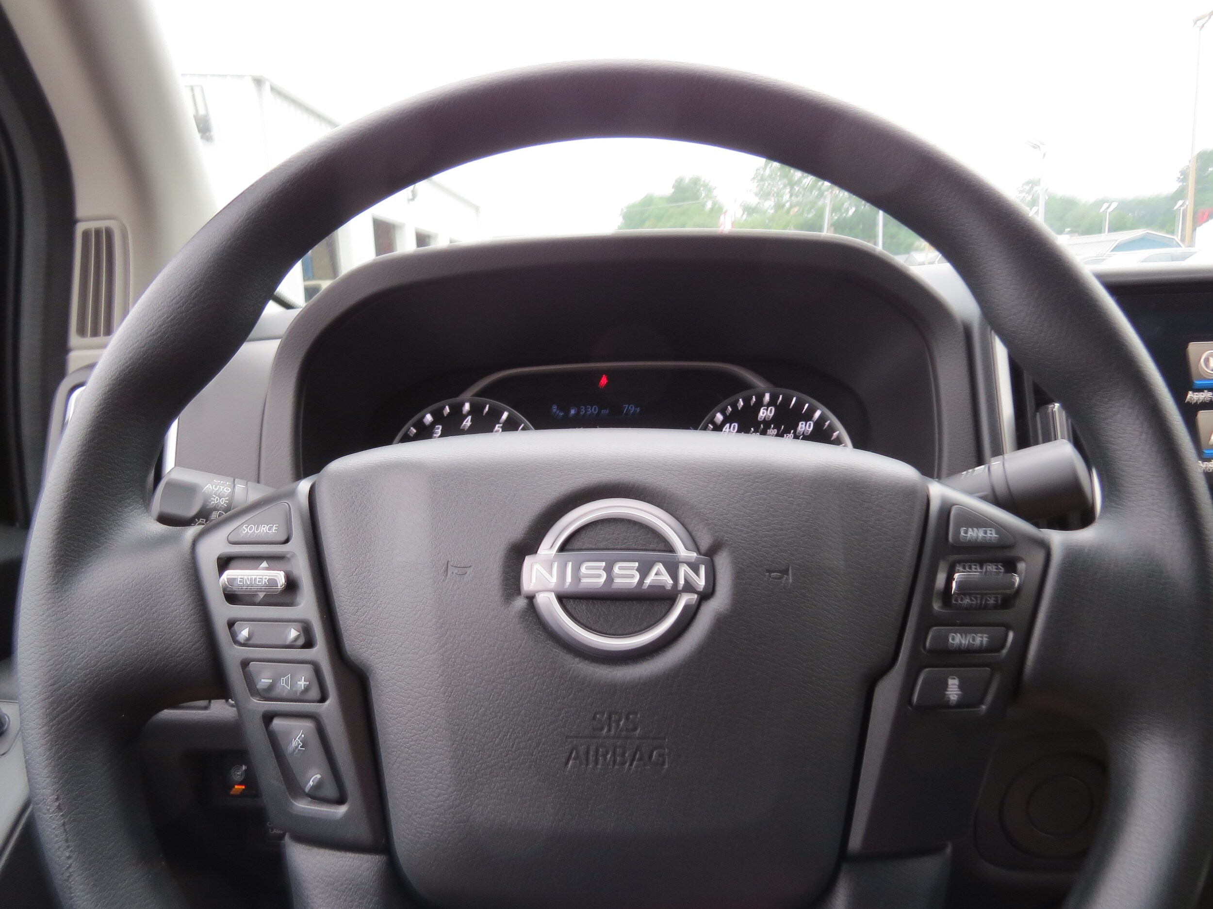 2025 Nissan Frontier SV Glacier White at Griffin Nissan