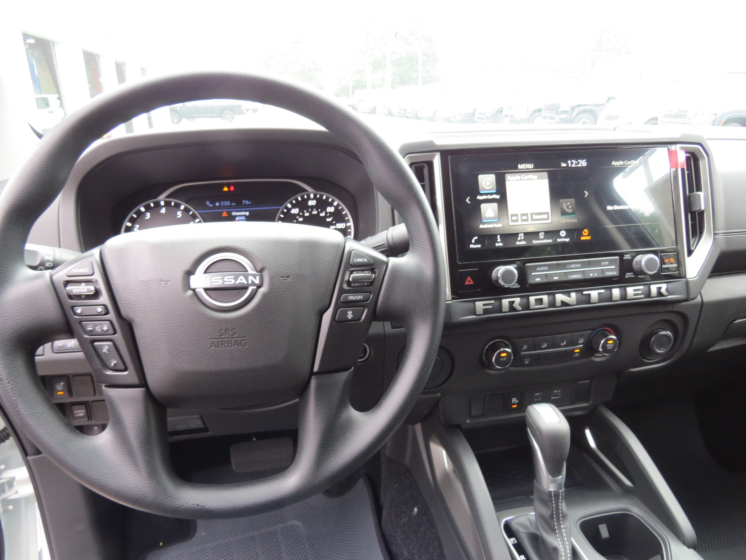 2025 Nissan Frontier SV Glacier White at Griffin Nissan