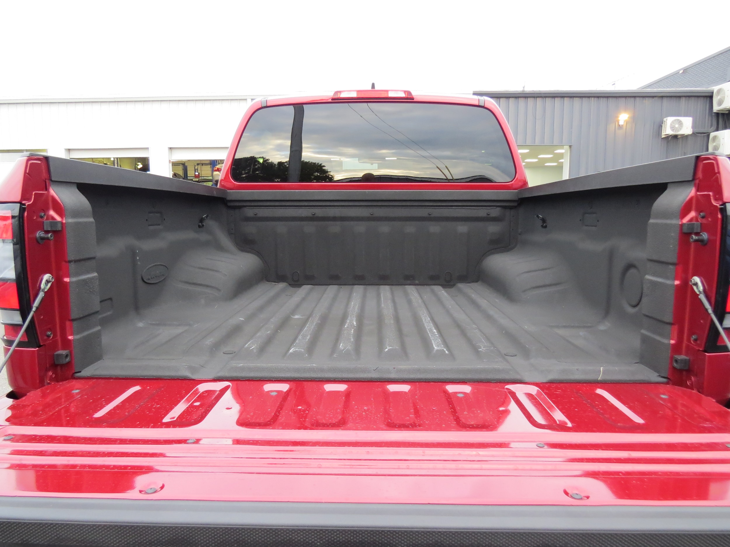 2024 Nissan Frontier SV Cardinal Red Metallic Tricoat at Griffin Nissan