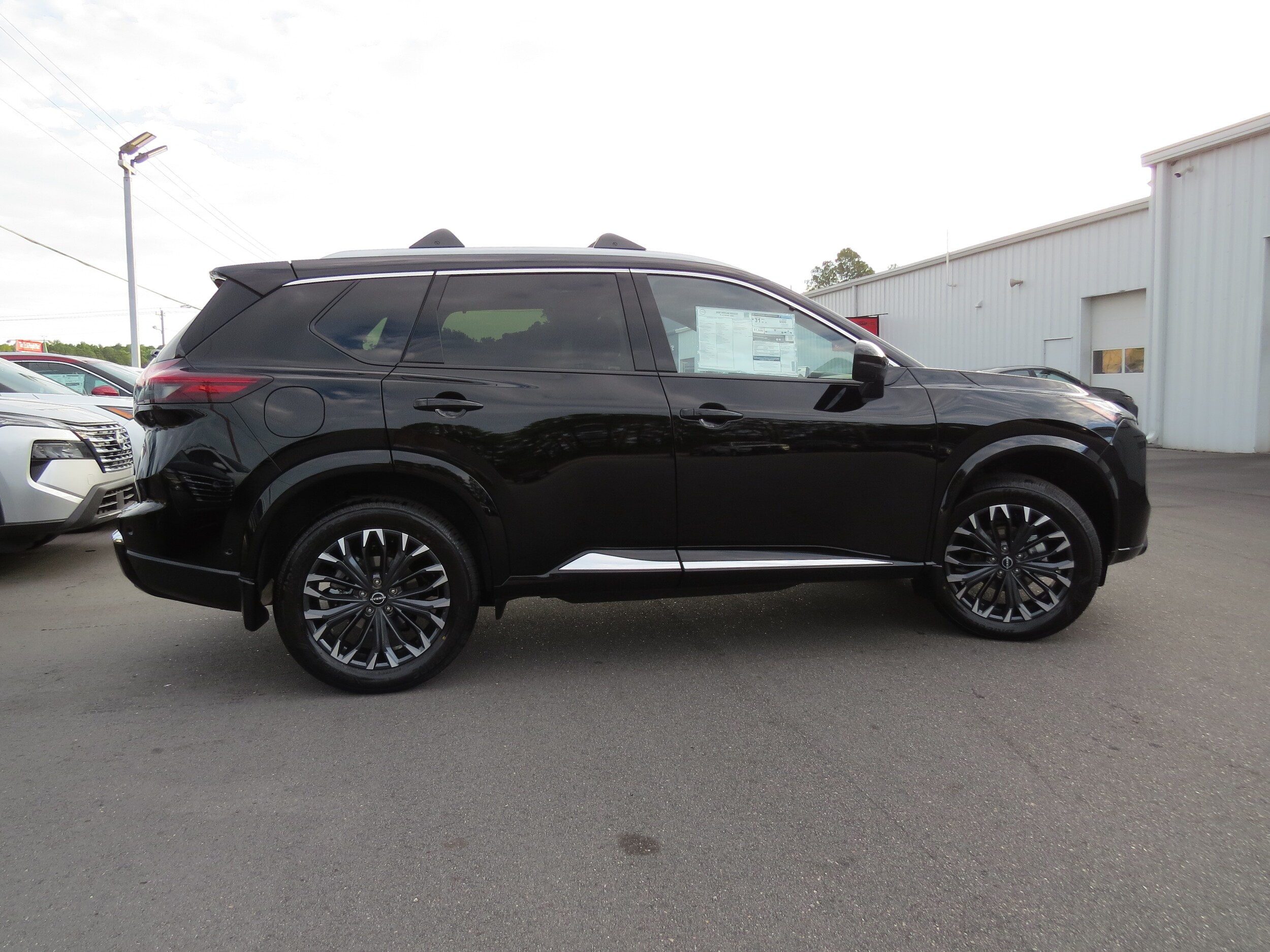 2026 Nissan Rogue Platinum Super Black at Griffin Nissan