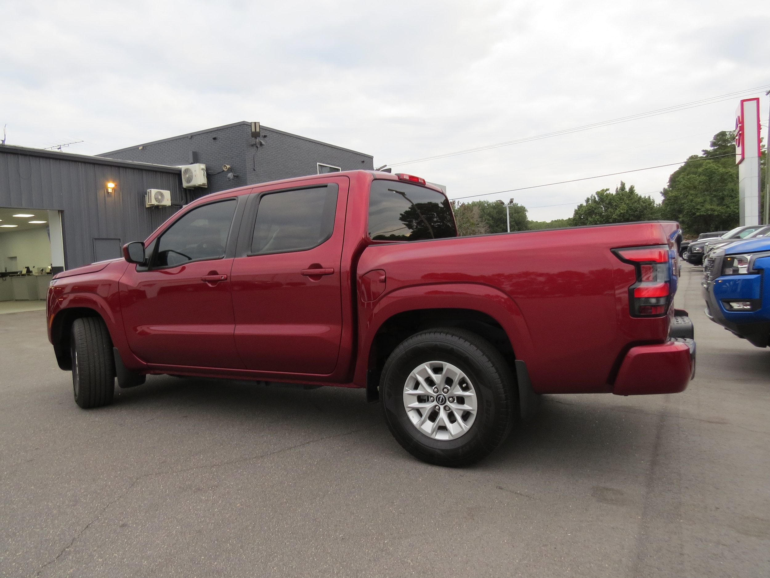 2024 Nissan Frontier SV Cardinal Red Metallic Tricoat at Griffin Nissan
